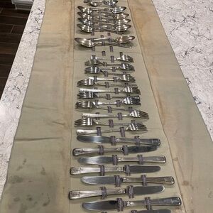 Wm. Rogers Sectional 48 pieces in carrier binder